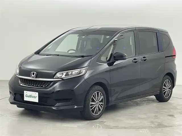 ホンダ フリード G ホンダセンシング 福岡県 2020(令2)年 5.4万km クリスタルブラックパール 社外ナビ　/バックカメラ　/ヘッドレストモニター　/ビルトインＥＴＣ　/ドラレコ　/ＡＣＣ　/衝突軽減ブレーキ　/レーンキープ　/アイドリングストップ　/両側電動スライドドア　/シートヒーター　/社外１５インチＡＷ　/ＬＥＤ