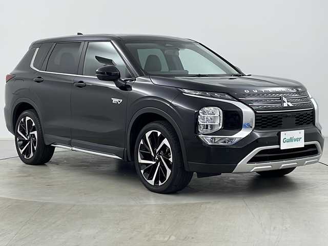 三菱 アウトランダー ＰＨＥＶ G 道央・札幌 2022(令4)年 2.9万km アメジストブラック ・ワンオーナー/・純正ナビ&BT&USB&AppleCarPlay/・アラウンドビューカメラ/・レーンキープ/・レーダークルーズコントロール/・サンルーフ/・衝突軽減ブレーキ/・ブラインドスポットモニター/・レーンキープアシスト/・フロントワイパーデアイサー/・ハーフレザー/・シートヒーター/・ステアリングヒーター/・ダウンヒルアシストコントロール/・パワーバックドア/・純正ETC2.0/・パドルシフト/・電動パーキングブレーキ/・ブレーキホールド/・純正20インチアルミホイール/・純正フロアマット/・AC100V電源1500W/・革巻きステアリング/・サイドアンダーガーニッシュ/・防眩ミラー