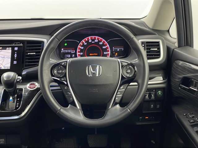 ホンダ オデッセイ アブソルート EX 栃木県 2014(平26)年 10.3万km ホワイトオーキッドパール 純正ナビ/（DVD/CD/AM・FM/BT/TV)/バックカメラ/横滑り防止装置/ブラインドストップモニター/アイドリングストップ/ETC/D席電動シート/後席オットマン/両側パワースライドドア/電動格納ミラー/ウインカーミラー/ステアリングリモコン/革巻きステアリング/純正１８インチAW/LEDライト