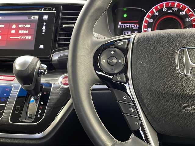 ホンダ オデッセイ アブソルート EX 栃木県 2014(平26)年 10.3万km ホワイトオーキッドパール 純正ナビ/（DVD/CD/AM・FM/BT/TV)/バックカメラ/横滑り防止装置/ブラインドストップモニター/アイドリングストップ/ETC/D席電動シート/後席オットマン/両側パワースライドドア/電動格納ミラー/ウインカーミラー/ステアリングリモコン/革巻きステアリング/純正１８インチAW/LEDライト