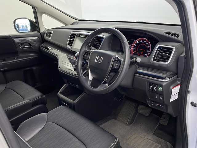 ホンダ オデッセイ アブソルート EX 栃木県 2014(平26)年 10.3万km ホワイトオーキッドパール 純正ナビ/（DVD/CD/AM・FM/BT/TV)/バックカメラ/横滑り防止装置/ブラインドストップモニター/アイドリングストップ/ETC/D席電動シート/後席オットマン/両側パワースライドドア/電動格納ミラー/ウインカーミラー/ステアリングリモコン/革巻きステアリング/純正１８インチAW/LEDライト