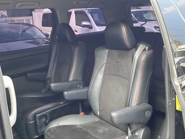 トヨタ ヴェルファイア 2．4Z ゴールデンアイズ 福岡県 2013(平25)年 6万km ブラック ALPINEナビ（Bluetooth・フルセグTV・CD・DVD再生）ALPINE後席用モニター/ドライブレコーダー/Verthandiアルミホイール/両側パワースライドドア/クリアランスソナー/電動リアゲート/GPSレーダー/ウッドコンビステアリング/電動格納ミラー/エアバッグ（運転席・助手席・サイド）/クルーズコントロール/パーキングアシスト/スマートキー/スペアキー/バックカメラ/プッシュスタート/3列シート/オットマン/ABS/横滑り防止装置/パワーステアリング/パワーウィンドウ/カーテンエアバッグ/保証書/取扱説明書
