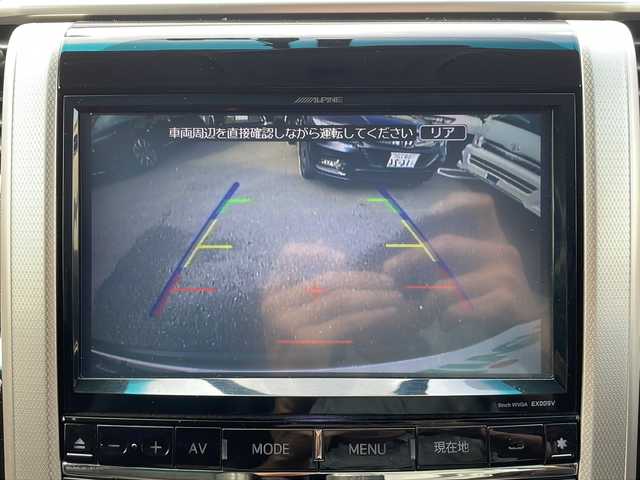 トヨタ ヴェルファイア 2．4Z ゴールデンアイズ 福岡県 2013(平25)年 6万km ブラック ALPINEナビ（Bluetooth・フルセグTV・CD・DVD再生）ALPINE後席用モニター/ドライブレコーダー/Verthandiアルミホイール/両側パワースライドドア/クリアランスソナー/電動リアゲート/GPSレーダー/ウッドコンビステアリング/電動格納ミラー/エアバッグ（運転席・助手席・サイド）/クルーズコントロール/パーキングアシスト/スマートキー/スペアキー/バックカメラ/プッシュスタート/3列シート/オットマン/ABS/横滑り防止装置/パワーステアリング/パワーウィンドウ/カーテンエアバッグ/保証書/取扱説明書