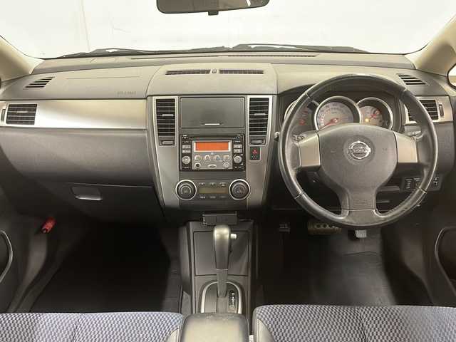 日産 ティーダ 15M FOUR 道央・札幌 2010(平22)年 10.9万km 黒 純正オーディオ/4WD/純正フロアマット/ETC