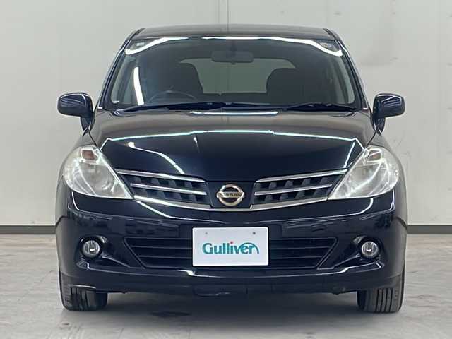 日産 ティーダ 15M FOUR 道央・札幌 2010(平22)年 10.9万km 黒 純正オーディオ/4WD/純正フロアマット/ETC