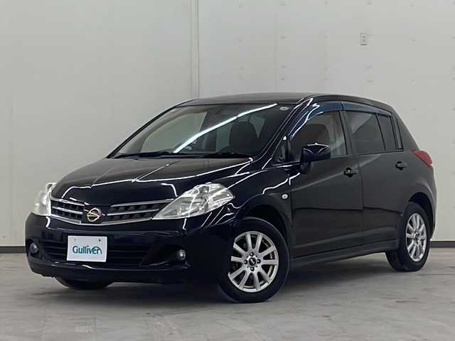 日産 ティーダ 15M FOUR 道央・札幌 2010(平22)年 10.9万km 黒 純正オーディオ/4WD/純正フロアマット/ETC