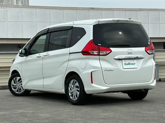 ホンダ フリード G ホンダセンシング 静岡県 2017(平29)年 2.3万km ホワイトオーキッドパール 社外7インチナビ/（FM/AM/Bluetooth/CD/DVD）/ホンダセンシング/クルーズコントロール/両側パワースライドドア/ETC/レーンキープアシスト/3列シート/チップアップシート/ドラレコ/スマートキー/プッシュスタート/エアバッグ/純正15AW