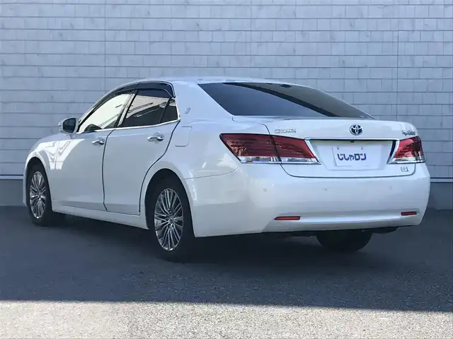 トヨタ クラウン ハイブリッド ロイヤルサルーン 栃木県 2014(平26)年 14.5万km ホワイトパールクリスタルシャイン )IDOMが運営する【じしゃロン小山店】の自社ローン専用車両になります。こちらは現金またはオートローンご利用時の価格です。自社ローンご希望の方は別途その旨お申付け下さい//禁煙車/純正フルセグナビ/（CD/DVD/AM/FMラジオ）/(Bluetooth)/スマートキー/プッシュスタート/バックカメラ/ＥＴＣ/クルーズコントロール/コーナーセンサー/パワーシート/シートヒーター/ステアリングヒーター/ステアリングリモコン/電動格納ドアミラー/パワーウインドウ/オートライト/自動防眩ミラー