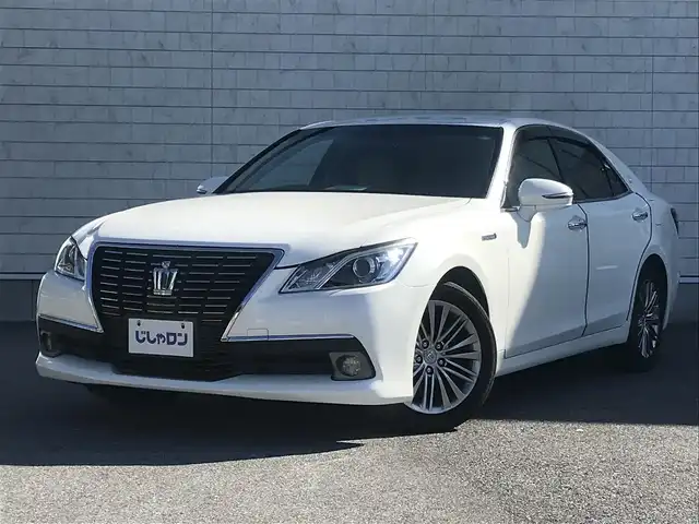 トヨタ クラウン ハイブリッド ロイヤルサルーン 栃木県 2014(平26)年 14.5万km ホワイトパールクリスタルシャイン )IDOMが運営する【じしゃロン小山店】の自社ローン専用車両になります。こちらは現金またはオートローンご利用時の価格です。自社ローンご希望の方は別途その旨お申付け下さい//禁煙車/純正フルセグナビ/（CD/DVD/AM/FMラジオ）/(Bluetooth)/スマートキー/プッシュスタート/バックカメラ/ＥＴＣ/クルーズコントロール/コーナーセンサー/パワーシート/シートヒーター/ステアリングヒーター/ステアリングリモコン/電動格納ドアミラー/パワーウインドウ/オートライト/自動防眩ミラー