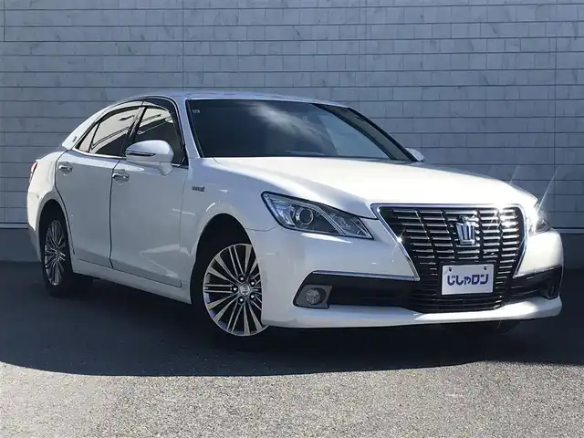 トヨタ クラウン ハイブリッド ロイヤルサルーン 栃木県 2014(平26)年 14.5万km ホワイトパールクリスタルシャイン )IDOMが運営する【じしゃロン小山店】の自社ローン専用車両になります。こちらは現金またはオートローンご利用時の価格です。自社ローンご希望の方は別途その旨お申付け下さい//禁煙車/純正フルセグナビ/（CD/DVD/AM/FMラジオ）/(Bluetooth)/スマートキー/プッシュスタート/バックカメラ/ＥＴＣ/クルーズコントロール/コーナーセンサー/パワーシート/シートヒーター/ステアリングヒーター/ステアリングリモコン/電動格納ドアミラー/パワーウインドウ/オートライト/自動防眩ミラー