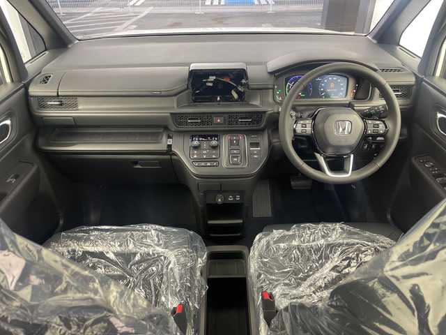 ホンダ ステップワゴン スパーダ eHEV 奈良県 2025(令7)年 0.1千km プラチナホワイトパール 登録済み未使用車/ナビ装着パッケージ/レーダークルーズコントロール/路外逸脱抑制システム/BSI/踏み間違い防止/コーナーセンサー/CMBS/両側パワースライドドア/パワーテールゲート/ハーフレザーシート/シートヒーター/ISOFIX/電子パーキング/BREAK HOLD/LEDヘッドライト/LEDフォグライト/オートライト/オートハイビーム/純正16インチアルミホイール/スマートキー/スペアキー