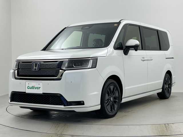 ホンダ ステップワゴン スパーダ eHEV 奈良県 2025(令7)年 0.1千km プラチナホワイトパール 登録済み未使用車/ナビ装着パッケージ/レーダークルーズコントロール/路外逸脱抑制システム/BSI/踏み間違い防止/コーナーセンサー/CMBS/両側パワースライドドア/パワーテールゲート/ハーフレザーシート/シートヒーター/ISOFIX/電子パーキング/BREAK HOLD/LEDヘッドライト/LEDフォグライト/オートライト/オートハイビーム/純正16インチアルミホイール/スマートキー/スペアキー