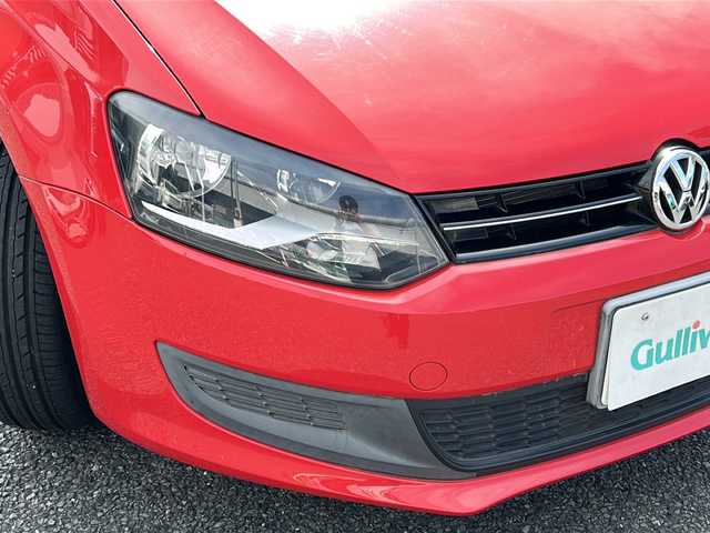 フォルクスワーゲン ポロ TSIコンフォートL BMテクノ 東京都 2013(平25)年 1.8万km フラッシュレッド ワンオーナー/社外ナビ/フルセグTV/DVD/CD/Bluetooth/電動格納ミラー/リモコンキー/フロアマット