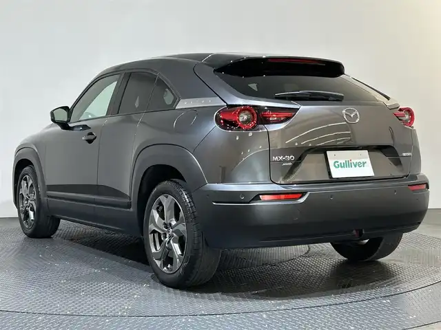 マツダ ＭＸ－３０ 愛媛県 2022(令4)年 3.5万km マシーングレープレミアムM ・ベーシックＰＫＧ＋モダンコンフィデンスパッケージ/・エクステリアＰＫＧ/・インテリアＰＫＧ（ホワイト内装）/・３６０°セーフティＰＫＧ/・ボーズサウンドシステム（ＡＵＤＩＯＰＩＬＯＴ２＋Ｃｅｎｔｅｒｐｏｉｎｔ２）＋１２スピーカー/・ユーティリティＰＫＧ/・セーフティＰＫＧ/・１０型ナビ/（フルセグＴＶ・ＢＴ・ＦＭ・ＡＭ・ＵＳＢ・ａｐｐｌｅｃａｒｐｌａｙ・ＨＤＭＩ）/・全方位カメラ　/・ＥＴＣ　/・前後ドラレコ　/・衝突軽減ブレーキ　/・レーンキープアシスト　/・レーダークルーズコントロール/・D席パワーシート/・DN席シートヒーター/・ステアリングヒーター/・BOSEプレミアムサウンド/・シートメモリー/・オートマチックハイビーム/・スペアキー