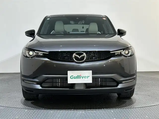 マツダ ＭＸ－３０ 愛媛県 2022(令4)年 3.5万km マシーングレープレミアムM ・ベーシックＰＫＧ＋モダンコンフィデンスパッケージ/・エクステリアＰＫＧ/・インテリアＰＫＧ（ホワイト内装）/・３６０°セーフティＰＫＧ/・ボーズサウンドシステム（ＡＵＤＩＯＰＩＬＯＴ２＋Ｃｅｎｔｅｒｐｏｉｎｔ２）＋１２スピーカー/・ユーティリティＰＫＧ/・セーフティＰＫＧ/・１０型ナビ/（フルセグＴＶ・ＢＴ・ＦＭ・ＡＭ・ＵＳＢ・ａｐｐｌｅｃａｒｐｌａｙ・ＨＤＭＩ）/・全方位カメラ　/・ＥＴＣ　/・前後ドラレコ　/・衝突軽減ブレーキ　/・レーンキープアシスト　/・レーダークルーズコントロール/・D席パワーシート/・DN席シートヒーター/・ステアリングヒーター/・BOSEプレミアムサウンド/・シートメモリー/・オートマチックハイビーム/・スペアキー