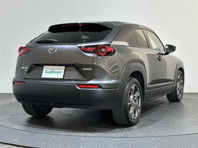 マツダ ＭＸ－３０ 愛媛県 2022(令4)年 3.5万km マシーングレープレミアムM ・ベーシックＰＫＧ＋モダンコンフィデンスパッケージ/・エクステリアＰＫＧ/・インテリアＰＫＧ（ホワイト内装）/・３６０°セーフティＰＫＧ/・ボーズサウンドシステム（ＡＵＤＩＯＰＩＬＯＴ２＋Ｃｅｎｔｅｒｐｏｉｎｔ２）＋１２スピーカー/・ユーティリティＰＫＧ/・セーフティＰＫＧ/・１０型ナビ/（フルセグＴＶ・ＢＴ・ＦＭ・ＡＭ・ＵＳＢ・ａｐｐｌｅｃａｒｐｌａｙ・ＨＤＭＩ）/・全方位カメラ　/・ＥＴＣ　/・前後ドラレコ　/・衝突軽減ブレーキ　/・レーンキープアシスト　/・レーダークルーズコントロール/・D席パワーシート/・DN席シートヒーター/・ステアリングヒーター/・BOSEプレミアムサウンド/・シートメモリー/・オートマチックハイビーム/・スペアキー