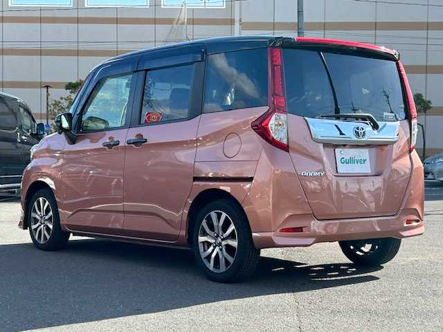 トヨタ ルーミー カスタムG－T 宮城県 2017(平29)年 7.7万km ブラックマイカメタリック/ブリリアントカッパークリスタルマイカ 2トーン 登録時走行距離76971km/純正SDナビ/フルセグTV/Bluetooth/CD/DVD/FM/AM/HDMI/後席モニター/15インチアルミ付きスタッドレスタイヤ/クルーズコントロール/両側パワースライド/ドライブレコーダー/シートヒーター/バックカメラ/オートライト/アイドリングストップ/横滑り防止装置/ステアリングリモコン/センターコンソール/プッシュスタート/スマートキー/LEDライト/ETC/コーナーセンサー/電動格納ミラー/ドアバイザ/純正アルミホイール