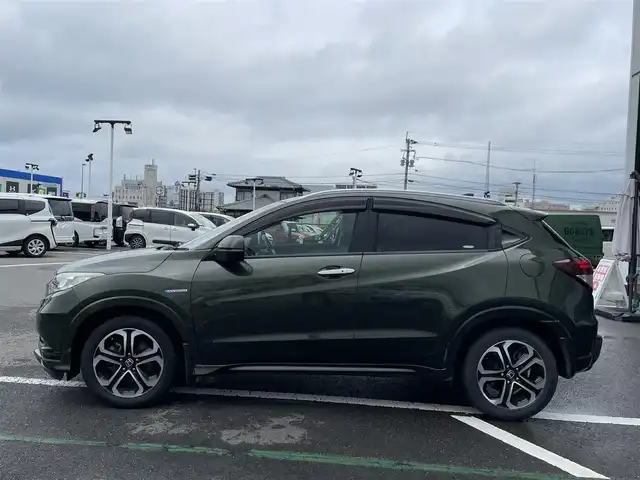 ホンダ ヴェゼル ハイブリッド Z 長崎県 2014(平26)年 12.4万km ミスティックグリーンパール ワンオーナー/純正メモリナビ/（ワンセグ・DVD・BT・CD・SD)/ハーフレザーシート/シートヒーター/パドルシフト/クルーズコントロール/オートライト/HID/ETC/横滑り防止/バックカメラ/スマートキー/スペアキー