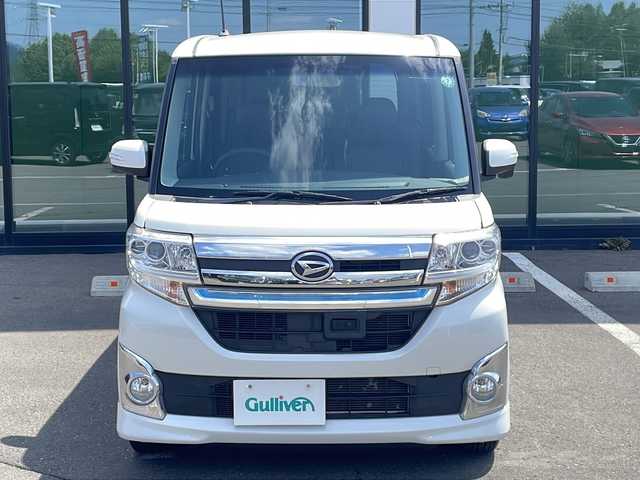 ダイハツ タント カスタム X トップED SA 道東・釧路十勝 2014(平26)年 5.5万km パールホワイトⅢ ・ワ ンオーナー/・4WD/・ 社外ナビ/（AM・FM・CD・DVD・フルセグ・BT）/・バックカメラ/・片側パワースライドドア/・純正エンジンスターター/・革調シートカバー/・スマートキー/・プッシュスタート/・衝突被害軽減ブレーキ/・アイドリングストップ/・純正アルミホイール/・純正LEDヘッドライト/・保証書/・取扱説明書