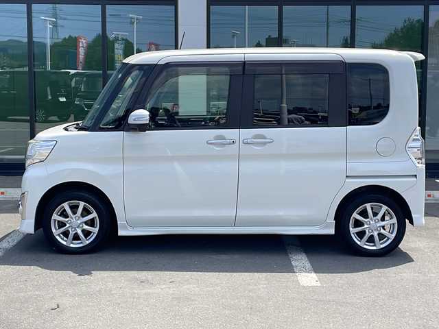 ダイハツ タント カスタム X トップED SA 道東・釧路十勝 2014(平26)年 5.5万km パールホワイトⅢ ・ワ ンオーナー/・4WD/・ 社外ナビ/（AM・FM・CD・DVD・フルセグ・BT）/・バックカメラ/・片側パワースライドドア/・純正エンジンスターター/・革調シートカバー/・スマートキー/・プッシュスタート/・衝突被害軽減ブレーキ/・アイドリングストップ/・純正アルミホイール/・純正LEDヘッドライト/・保証書/・取扱説明書