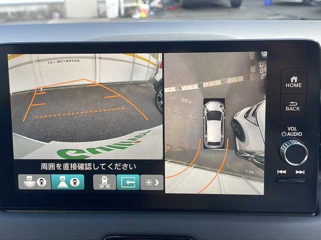 ホンダ ヴェゼル ハイブリッド e:HEV Z 愛知県 2023(令5)年 1.9万km プラチナホワイトパール /禁煙車//ワンオーナー//メーカーナビ//フルセグ/BT/USB/FM/AM//マルチビューカメラシステム//ハンズフリーパワーテールゲート//予約クローズ//純正18AW//HONDA SENSING//CMBS//ACC//先行車発進お知らせ//路外逸脱抑制システム//標識認識機能//踏み間違い衝突軽減システム//歩行者事故軽減システム//LKAS(車線維持支援システム）//BSM//パーキングセンサーシステム//ビルトインETC2.0//前後ドライブレコーダー//ワイヤレス充電//HONDA純正マフラーカッター(08F53-3M0)//LEDオートライト//オートハイビーム//Fフォグ//DRIVE MODE//SPORT/NORMAL/ECON//ヒルディセントコントロール//電子パーキング//BRAKE HOLD//プッシュスタート//黒ハーフレザーシート//前席シートヒーター//革巻ステアリング//パドルシフト//ステアリングヒーター//防眩ルームミラー//ステアリングスイッチ//純正フロアマット//リアサンシェード//USB充電//新車時保証書//取扱説明書/ナビ取説//スマートキー//スマートスペアキー