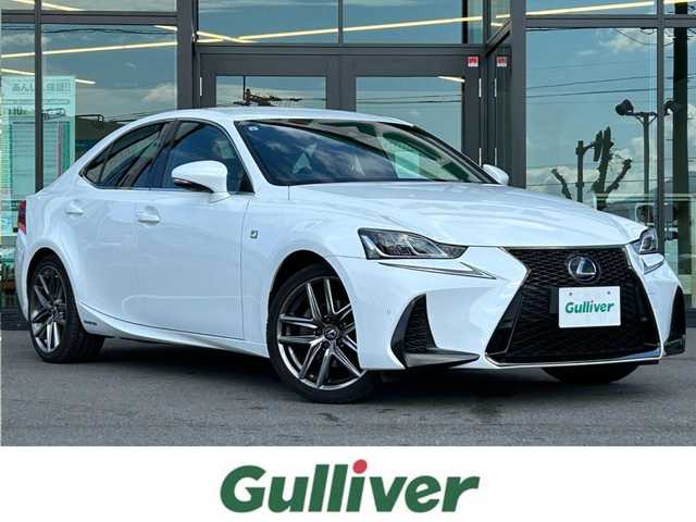 レクサス ＩＳ 300h Fスポーツ 愛媛県 2019(令1)年 7.4万km ホワイトノーヴァガラスフレーク 純正ナビ（Bluetooth/フルセグTV/DVD・Blu-ray再生）/ETC/前方ドライブレコーダー/アダプティブクルーズコントロール/バックカメラ/パワーシート/シートヒーター/ステアリングヒーター/カードキー/純正フロアマット/純正アルミホイール/前後コーナーセンサー/オートマチックハイビーム/LEDヘッドライト/カーテンエアバッグ