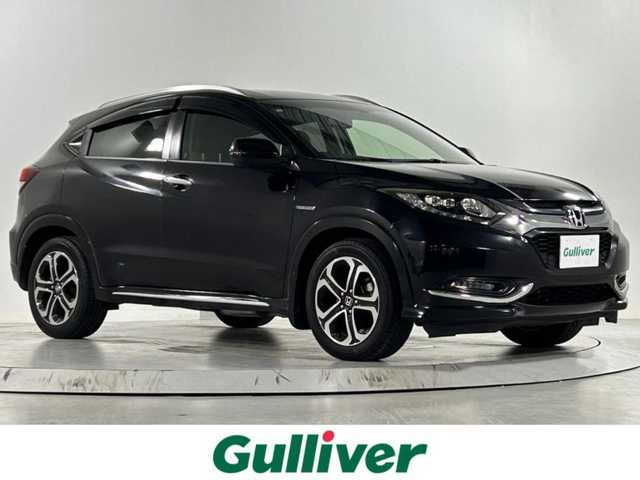 ホンダ ヴェゼル ハイブリッド Z ホンダセンシング 佐賀県 2017(平29)年 4.1万km クリスタルブラックパール 純正９型ナビ/（フルセグTV/AM/FM/Bluetooth/HDMI）/衝突軽減システム/バックカメラ/クルーズコントロール/ハーフレザーシート/シートヒーター/純正17インチアルミホイール/純正フロアマット/ルーフレール/ＬＥＤヘッドライト/フォグライト/オートライト/オートマチックハイビーム/ドアバイザー/ステアリングリモコン/革巻きステアリング/スマートキー/プッシュスタート/横滑り防止装置/盗難防止装置