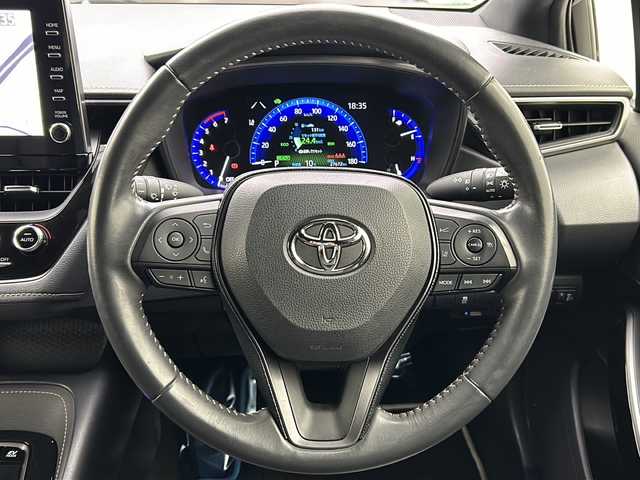 トヨタ カローラツーリング ハイブリッド ダブルバイビー 宮城県 2019(令1)年 2.8万km ホワイトパールクリスタルシャイン 純正9型ディスプレイオーディオナビ/(AM/FM/USB/BT/TV/Miracast)/バックカメラ/ビルトインETC2.0/トヨタセーフティーセンス/レーダークルーズコントロール/BSM/ハーフレザー/プッシュスタート/スマートキー/スペアキー/オートライト/オートマチックハイビーム/LEDヘッドライト/フォグランプ/ヘッドライトレベライザー/ドアバイザー/純正フロアマット/純正17インチアルミホイール/禁煙車