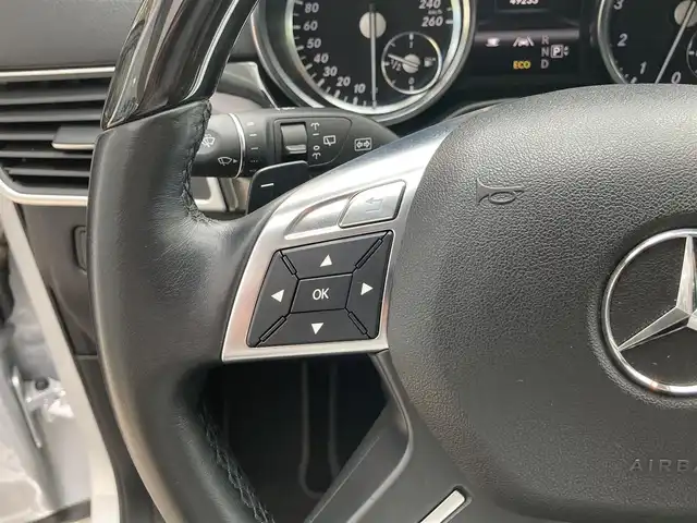 メルセデス・ベンツ ＧＬ５５０ 4MATIC AMGエクスクルーシブ 長崎県 2013(平25)年 5万km イリジウムシルバー 左ハンドル車/サンルーフ/電動稼働黒革シート/(シートヒーター・エアシート)/後席モニター/プレミアムサウンド【harman/kardon】/メーカーOP・HDDナビ/(Bluetooth接続・フルセグTV・DVD再生)/全方位カメラ・バックカメラ/レーダークルーズコントロール/レーンキープアシスト/衝突被害軽減ブレーキ/後方車両接近警報/パワーバックドア/ETC/ダウンヒルアシスト/コーナーセンサー/ウッドコンビステアリング/ステアリングスイッチ/パドルシフト/LEDオートヘッドライト