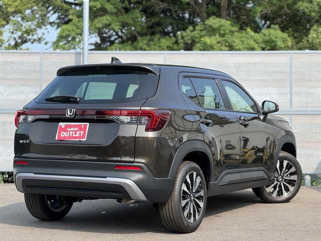 ホンダ ＷＲ－Ｖ Z 三重県 2025(令7)年 0.1万km未満 ゴールドブラウンM 登録未使用車/ホンダセンシング /・衝突軽減ブレーキ/・誤発進抑制機能/・後方誤発進抑制機能/・近距離衝突軽減ブレーキ/・歩行者事故低減ステアリング/・路外逸脱抑制機能/・アダプティブクルーズコントロール/・車線維持支援システム/・先行車発進お知らせ機能/・標識認識機能/・オートハイビーム/・パーキングセンサーシステム/ナビ装着用スペシャルパッケージ/・ステアリングスイッチ/　(オーディオ/ナビ/ハンズフリー/音声認識)/・リアワイドカメラ/・車載通信機/・Bluetoothユニット/パドルシフト/USBジャック(運転席)/充電用USBジャック(助手席)/純正17インチ5本マルチスポークアルミホイール/フルLEDヘッドランプ/・オートライト/LEDフロントフォグランプ/プッシュエンジンスタート/スマートキー×2