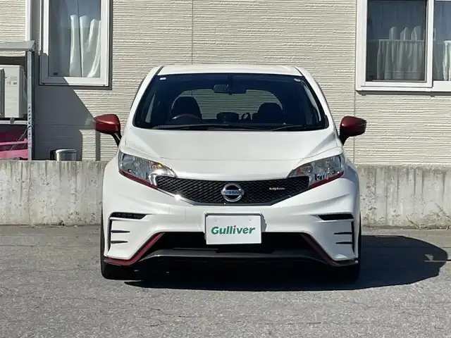 日産 ノート ニスモ 青森県 2014(平26)年 10.9万km ブリリアントホワイトパール 社外メモリナビ/・フルセグTV/・AM/FM/CD/DVD/BT/NISMOエアロ/純正フロアマット/純正16AW/純正ドアバイザー/横滑り防止機能/アイドリングストップ/オートライト/スターター/スペアキー/保証書/取扱説明書