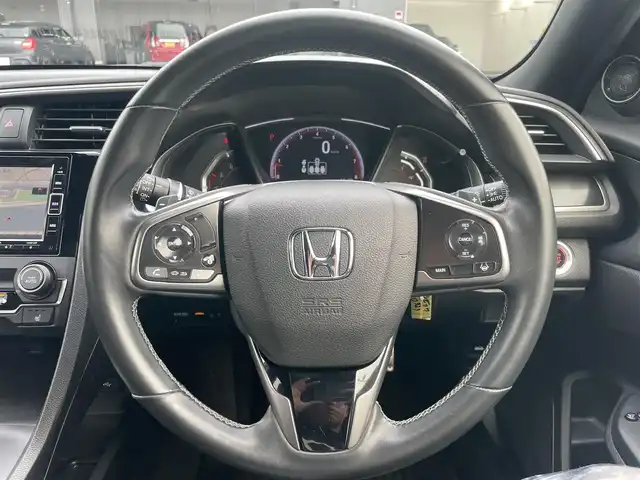 ホンダ シビック ハッチバック 愛知県 2020(令2)年 4.3万km ソニックグレーパール サンルーフ/ホンダセンシング/純正7インチナビ/・フルセグTV/・Bluetooth/・CD/DVD/レーダークルーズコントロール/黒革シート/パワーシート（D/N）/ステアリングリモコン/革巻きステアリング/パドルシフト/前席シートヒーター/ETC2.0/LEDライト/電動パーキングシステム/ブレーキホールド/純正AW