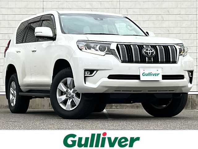 トヨタ ランドクルーザー プラド TX Lパッケージ 新潟県 2022(令4)年 2.3万km ホワイトパールクリスタルシャイン ワンオーナー/衝突軽減/純正ナビ/(AM/FM/BT/フルセグ)/全方位カメラ/社外前後ドライブレコーダー/クルーズコントロール/BSM/ETC2.0/コーナーセンサー/ベージュ革シート/シートヒーター/エアーシート/パワーシート/MTモード付きAT/革巻きウッドコンビステアリング/ステアリングスイッチ/AUTOハイビーム/AUTOライト/LEDヘッドライト/フォグランプ/横滑り防止/プッシュスタート/スマートキー