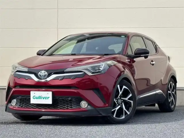 トヨタ Ｃ－ＨＲ G 茨城県 2017(平29)年 7.9万km センシュアルレッドマイカ 純正SDナビ/　(CD/DVD/USB/Bluetooth/フルセグ/HDMI)/バックカメラ/ブラインドスポットモニター/ローダウン車高調/セーフティセンス（衝突回避支援パッケージ）/・プリクラッシュセーフティ/・レーンディパーチャーアラート/・オートマチックハイビーム/・レーダークルーズコントロール/クリアランスソナー/ETC2.0/快適温熱シート/LEDヘッドライト/シーケンシャルターンランプ/足元イルミネーションランプ/パワーステアリング/純正アルミホイール/オートライト/保証書