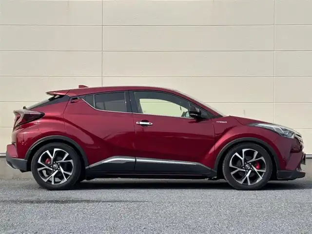 トヨタ Ｃ－ＨＲ G 茨城県 2017(平29)年 7.9万km センシュアルレッドマイカ 純正SDナビ/　(CD/DVD/USB/Bluetooth/フルセグ/HDMI)/バックカメラ/ブラインドスポットモニター/ローダウン車高調/セーフティセンス（衝突回避支援パッケージ）/・プリクラッシュセーフティ/・レーンディパーチャーアラート/・オートマチックハイビーム/・レーダークルーズコントロール/クリアランスソナー/ETC2.0/快適温熱シート/LEDヘッドライト/シーケンシャルターンランプ/足元イルミネーションランプ/パワーステアリング/純正アルミホイール/オートライト/保証書