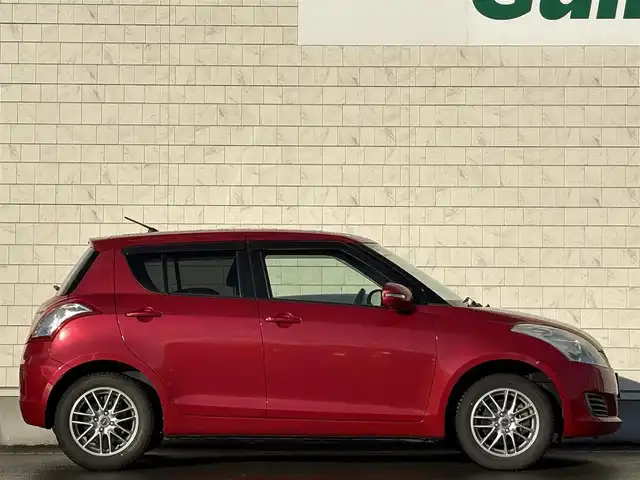 スズキ スイフト XL 岩手県 2011(平23)年 4.6万km アブレイズレッドパール2 禁煙車/4WD/前席シートヒーター/純正ナビ/→ワンセグTV/CD/DVD/FM/AM/ステアリングスイッチ/〇プッシュスタート/〇電動格納ミラー/〇ウィンカーミラー/〇フロアマット/〇ドアバイザー/〇シガーソケット/ETC/夏タイヤ社外AW車載
