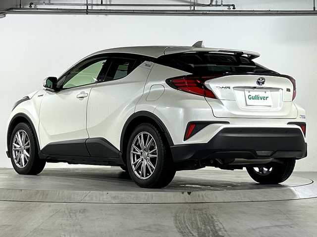 トヨタ Ｃ－ＨＲ G 広島県 2021(令3)年 2.9万km ホワイトパールクリスタルシャイン 禁煙/トヨタセーフティセンス/・プリクラッシュセーフティ/・レーンディパーチャーアラート/・オートマチックハイビーム/・先行車発進お知らせ/・レーダークルーズコントロール/クリアランスソナー/BSM/純正ディスプレイオーディオ/・ナビ/フルセグ/Bluetooth/USB/パノラミックビューモニター/革巻きステアリング/ステアイングスイッチ/オートライト/ハーフレザーシート/シートヒーター/電動パーキングブレーキ/ブレーキホールド/LEＤヘッドライト/フォグランプ/自動防眩ミラー/前後ドライブレコーダー（GL-05AP）/ＥＴＣ/純正フロアマット/純正ドアバイザー/トノカバー/純正アルミホイール車載（サマータイヤ）/W+サイド+カーテンエアバック