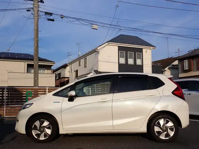ホンダ フィット ハイブリット Lパッケージ 千葉県 2014(平26)年 6.6万km パール ワンオーナー/純正メーカーナビ/　　AM/FM/CD/DVD/Bluetooth/フルセグTV/ビルトインETC/クルーズコントロール/バックカメラ/スマートキー/プッシュスタート/スマートキー/スペアキー1本/ドアバイザー/取扱説明書/保証書