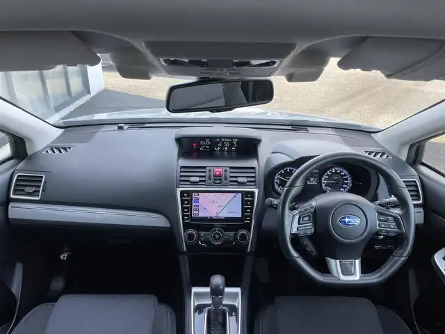 スバル レヴォーグ 1．6GT－S アイサイト プラウドED 道央・札幌 2015(平27)年 8.1万km クリスタルホワイトP ４WD/純正ディーラーOPナビ/CD/DVD/BT/フルセグ/アイサイト/アイサイト/衝突被害軽減ブレーキ/横滑り防止装置/レーダークルーズコントロール/レーンキープアシスト/ヒルスタートアシスト/ブラインドスポットモニター/バック/サイドカメラ/ビルトインETC/アイドリングストップ/SI-DRIVE/自動防眩ミラー/D席パワーシート/革巻きステアリング/ステアリングリモコン/パドルシフト/電動パーキング/プッシュスタート/スマートキー/LEDヘッドライト/オートライト/フォグランプ/電動格納ミラー/ウィンカーミラー/純正フロアマット/スペアキー