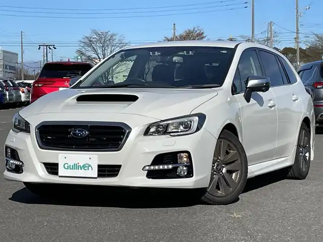 スバル レヴォーグ 1．6GT－S アイサイト プラウドED 道央・札幌 2015(平27)年 8.1万km クリスタルホワイトP ４WD/純正ディーラーOPナビ/CD/DVD/BT/フルセグ/アイサイト/アイサイト/衝突被害軽減ブレーキ/横滑り防止装置/レーダークルーズコントロール/レーンキープアシスト/ヒルスタートアシスト/ブラインドスポットモニター/バック/サイドカメラ/ビルトインETC/アイドリングストップ/SI-DRIVE/自動防眩ミラー/D席パワーシート/革巻きステアリング/ステアリングリモコン/パドルシフト/電動パーキング/プッシュスタート/スマートキー/LEDヘッドライト/オートライト/フォグランプ/電動格納ミラー/ウィンカーミラー/純正フロアマット/スペアキー
