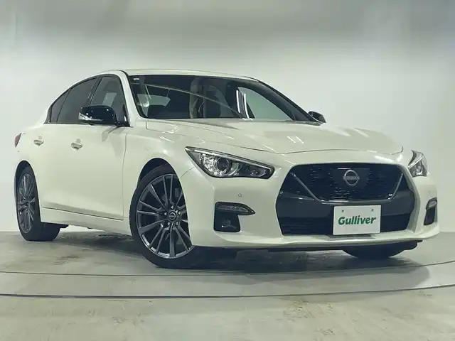 日産 スカイライン 400R 神奈川県 2023(令5)年 3.2万km ブリリアントホワイトパール 400R専用エクステリア/対向レッドキャリパー/純正HDDナビ/Apple Carplay/フルセグTV/全周囲カメラ/黒革シート/前席パワーシート/前席シートヒーター/ACC/エマージェンシーブレーキ/BSM/LKA/Nissan Connect/ETC2.0/パドルシフト/前方ドライブレコーダー