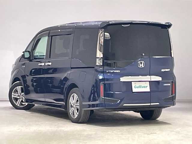 ホンダ ステップワゴン スパーダ ハイブリッド G ホンダセンシング 宮城県 2018(平30)年 6.3万km オブシダンブルーパール ホンダセンシング/・衝突軽減ブレーキ/・誤発進抑制機能/・路外逸脱抑制機能/・車線維持支援システム/・アダプティブ・クルーズ・コントロール/・先行者発進お知らせ機能/・標識認識機能/純正ナビ/・型番：VXM-175VFNi/・フルセグTV/Bluetooth/CD/DVD/・バックカメラ/・USB入力端子/・純正ETC/・前方ドライブレコーダー/純正フリップダウンモニター/両側パワースライドドア/アイドリングストップ/電子パーキング/・オートブレーキホールド/革巻きステアリング/・ステアリングリモコン/プッシュスタート/・スマートキー/LEDヘッドライト/・オートライト/・フォグランプ/純正アルミホイール/純正フロアマット/ドアバイザー