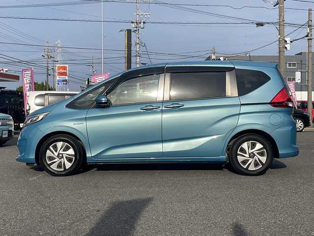 ホンダ フリード＋ ハイブリット G 愛知県 2017(平29)年 7.5万km ブルーホライゾンM /禁煙/スローパー車//ディーラー整備記録簿H29.30.31.R2.4.5.6.7//純正9インチナビ/フルセグ/CD/DVD/SD/MSV/BT//AppleCarPlay/AndroidAuto//バックカメラ/純正前後ドラレコ/ビルトインETC//両側パワースライドドア//ステアリングスイッチ//リアロールサンシェード//ACC/LKAS/CMBS/RSA/先行車発信告知/路外逸脱抑制//プッシュスタート/スマートキー//純正フロアマット/純正ドアバイザー//新車時保証書//取扱説明書//スペアスマートキー有