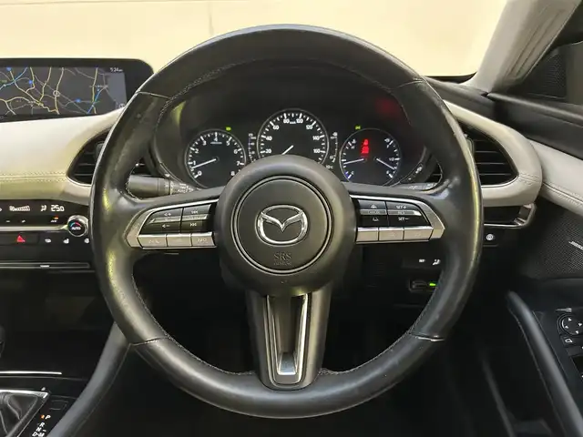 マツダ マツダ３セダン X Lパッケージ 茨城県 2020(令2)年 5.5万km ジェットブラックマイカ メーカーＯＰナビ/　（AM/FM/BT/CD/DVD)/HDMI/フルセグテレビ/バックカメラ/ビルトインETC/プッシュスタート/シートヒーター/ハンドルヒーター/パワーシート/レーダークルーズコントロール/BOSEサウンド/革シート/純正フロアマット/パワーバックドア