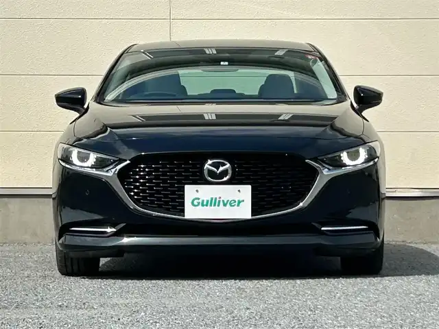 マツダ マツダ３セダン X Lパッケージ 茨城県 2020(令2)年 5.5万km ジェットブラックマイカ メーカーＯＰナビ/　（AM/FM/BT/CD/DVD)/HDMI/フルセグテレビ/バックカメラ/ビルトインETC/プッシュスタート/シートヒーター/ハンドルヒーター/パワーシート/レーダークルーズコントロール/BOSEサウンド/革シート/純正フロアマット/パワーバックドア
