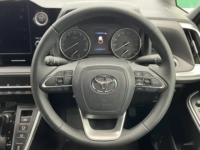 トヨタ ヴォクシー S－G 鹿児島県 2023(令5)年 1.2万km ホワイトパールクリスタルシャイン 禁煙車/10.5インチ純正ディスプレイオーディオ/　・フルセグTV/Bluetooth/トヨタセーフティセンス/　・プリクラッシュセーフティー/　・緊急時操蛇支援/　・レーントレーシングアシスト/　・レーダークルーズコントロール/　・オートマチックハイビーム/　・ロードサインアシスト/　・ドライバー異常時対応システム/　・発信遅れ告知機能/両側パワースライド/電動パーキングブレーキ/ブレーキホールド/純正フロアマット/前後ドライブレコーダー/全席オートウィンドウ/ドアバイザー/ETC/後席サンシェード/本革巻きハンドル