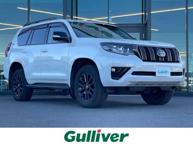 トヨタ ランドクルーザー プラド TX-L 70thアニバーサリーLTD 東京都 2022(令4)年 2.3万km ホワイトパールクリスタルシャイン 7人乗り/サンルーフ/純正メーカーOPナビ/パノラミックビューモニター/本革シート　（パワーシート）/シートヒーター / ベンチレーション/3列目電動格納シート/ビルトインETC 2.0/LEDヘッドライト/フォグ/セーフティセンス/・プリクラッシュセーフティ/・レーントレーシングアシスト/・オートハイビーム/・レーダークルーズコントロール/・ブラインドスポットモニタ/純正18インチーフ/純正メーカーOPナビ/パノラミックビューモニター/本革シート　（パワーシート）/シートヒーター / ベンチレーション/3列目電動格納シート/ビルトインETC 2.0/LEDヘッドライト/フォグ/セーフティセンス/・プリクラッシュセーフティ/・レーントレーシングアシスト/・オートハイビーム/・レーダークルーズコントロール/・ブラインドスポットモニタ/純正18インチAW/ルーフレール