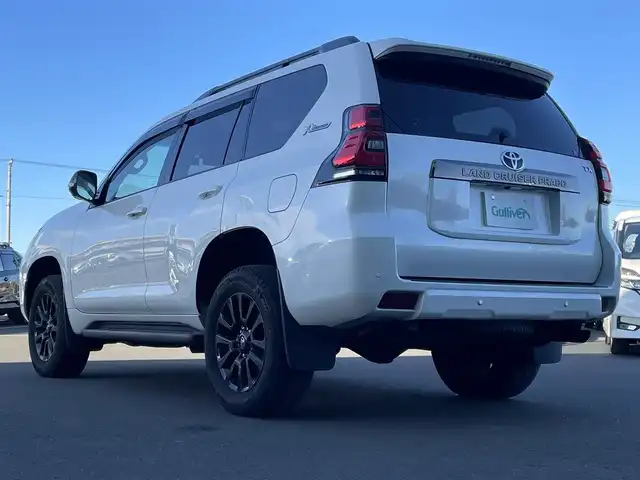 トヨタ ランドクルーザー プラド TX-L 70thアニバーサリーLTD 東京都 2022(令4)年 2.3万km ホワイトパールクリスタルシャイン 7人乗り/サンルーフ/純正メーカーOPナビ/パノラミックビューモニター/本革シート　（パワーシート）/シートヒーター / ベンチレーション/3列目電動格納シート/ビルトインETC 2.0/LEDヘッドライト/フォグ/セーフティセンス/・プリクラッシュセーフティ/・レーントレーシングアシスト/・オートハイビーム/・レーダークルーズコントロール/・ブラインドスポットモニタ/純正18インチーフ/純正メーカーOPナビ/パノラミックビューモニター/本革シート　（パワーシート）/シートヒーター / ベンチレーション/3列目電動格納シート/ビルトインETC 2.0/LEDヘッドライト/フォグ/セーフティセンス/・プリクラッシュセーフティ/・レーントレーシングアシスト/・オートハイビーム/・レーダークルーズコントロール/・ブラインドスポットモニタ/純正18インチAW/ルーフレール