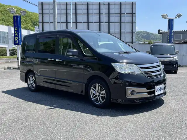 日産 セレナ ライダー ブラックライン 山形県 2012(平24)年 10.5万km スーパーブラック (株)IDOMが運営する【じしゃロン山形店】の自社ローン専用車両になります。/こちらは現金またはオートローンご利用時の価格です。/自社ローンご希望の方は別途その旨お申付け下さい。/純正SDナビ/（CD/DVD/TV/BT・AM/FM）/バックカメラ/ETC/両側パワースライドドア/クルーズコントロール/アイドリングストップ/横滑り防止機能装置/フリップダウンモニター/スマートキー/プッシュスタート/ドアバイザー/電動格納ミラー