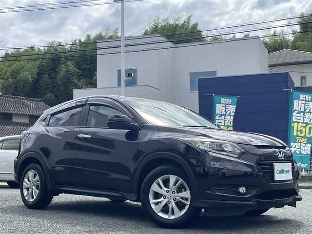 ホンダ ヴェゼル X ホンダセンシング 熊本県 2016(平28)年 4.9万km クリスタルブラックパール ワンオーナー/社外ナビ（AVIC-RL901）/【フルセグTV/Bluetooth再生/CD/DVD】/バックカメラ/クルーズコントロール/革巻きステアリング/ステアリングスイッチ/LEDオートライト/フォグライト/アイドリングストップ/ETC/社外テールランプ/電動格納ミラー/純正フロアマット/ドアバイザー/保証書/取扱説明書